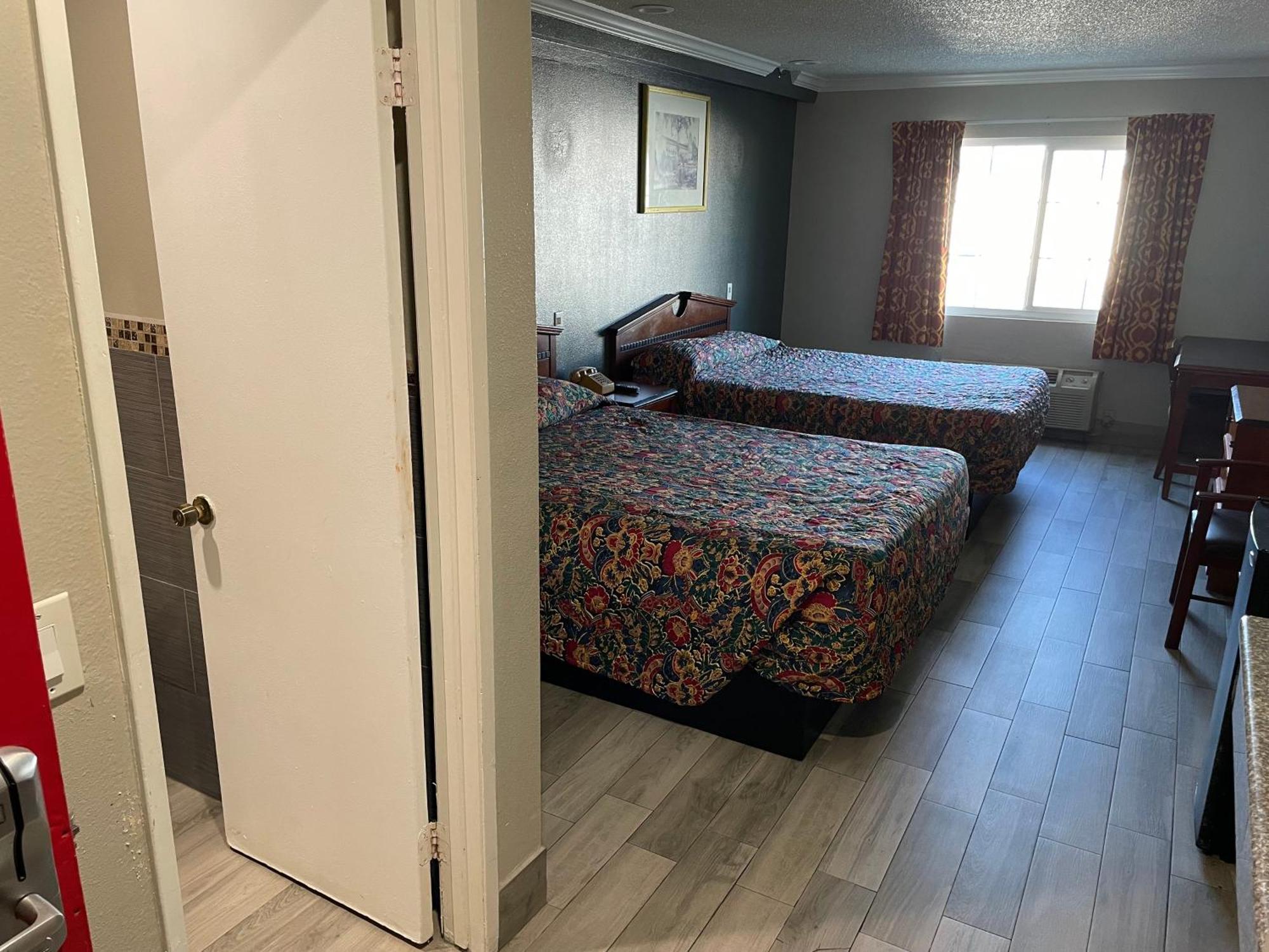 Heritage Inn And Suites Corona Buitenkant foto